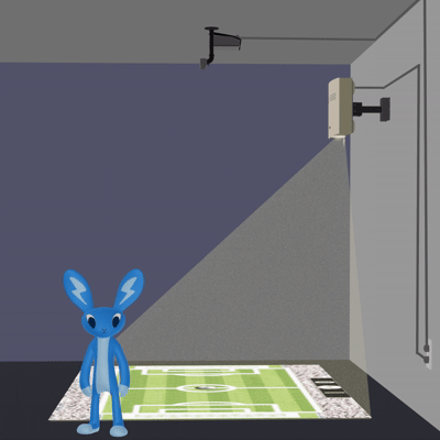 Side view of an interactive projection floor system with lens displacement installed on the wall.